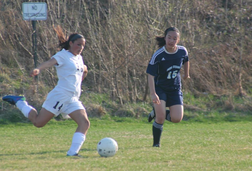 Jessica Coia crosses the ball during a match against IMSA on Mar. 3.