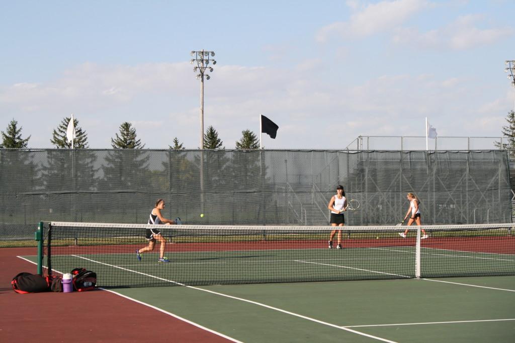 Tennis clinches conference