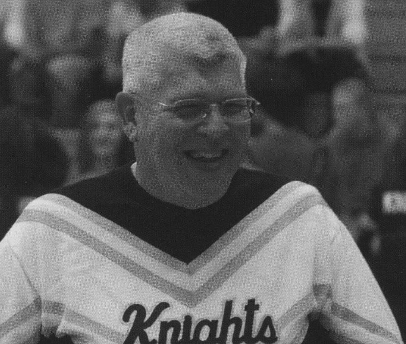 Mr. Butler dressed in old Kaneland gear and KHS assembly 
