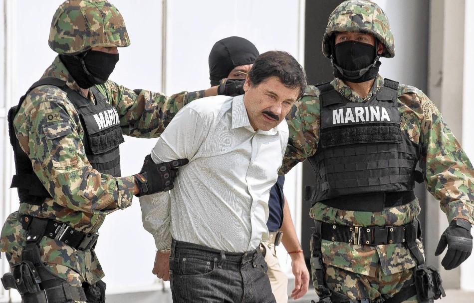 Mexican Navy Marines transport El chapo to a secure facility. 