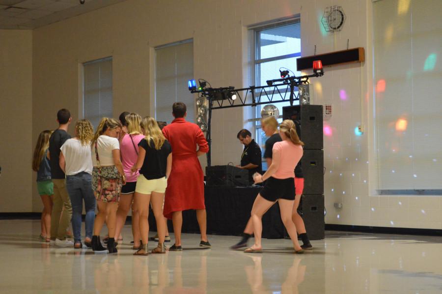 Students dance in the cafeteria on August 22. 