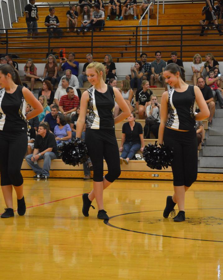 Pom team members during their routine. 