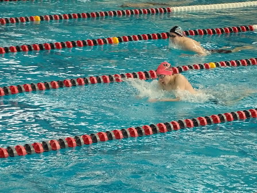 Sophomore+Thaddeus+Thompson+swims+in+a+recent+meet.+
