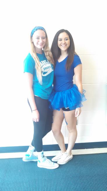 Seniors Annmarie Franz and Julia Dunfrund wear blue for class color day.  