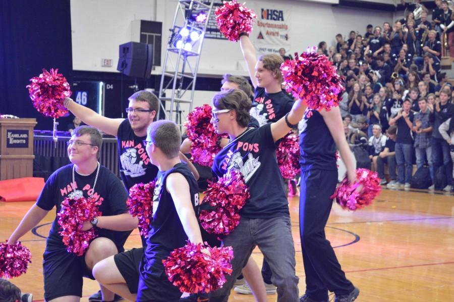 The 2015 man poms perform their dance routine. 