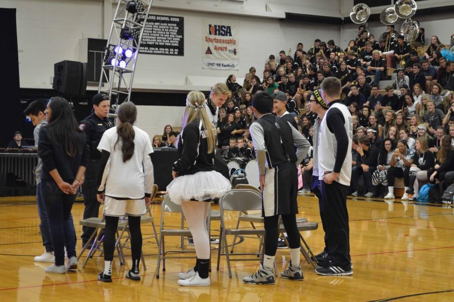 Students and staff members compete in a friendly match of musical chairs. 