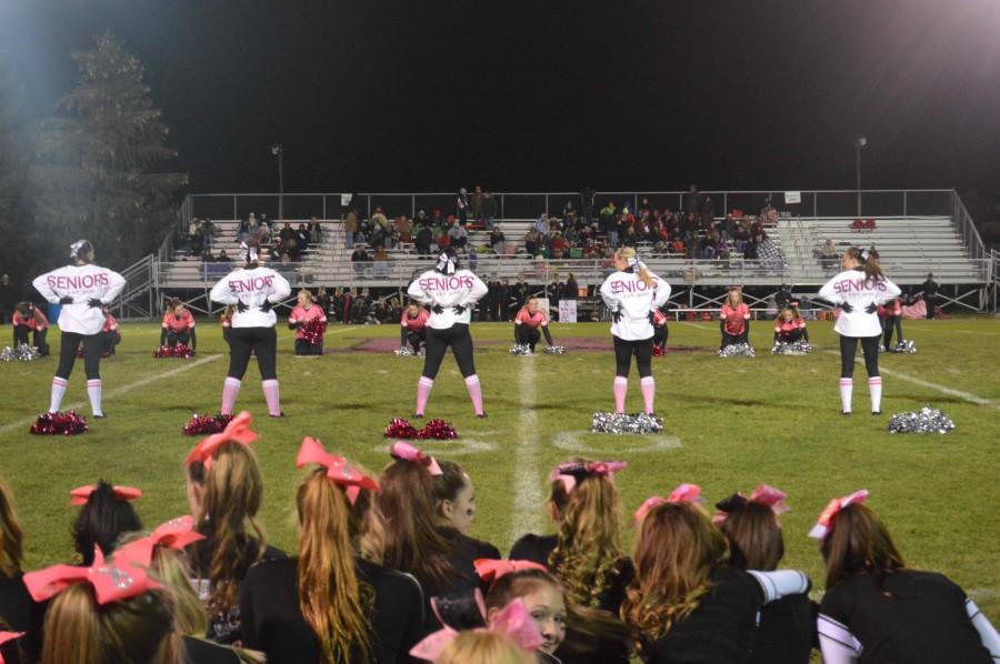 Seniors start in the front of the routine for what could potentially be their last half time show on Peterson Field. 