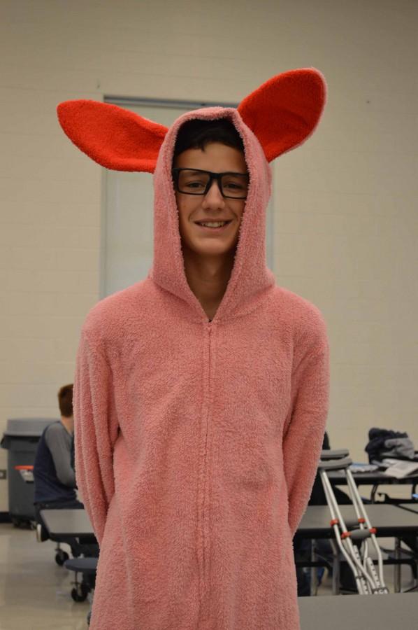 Freshman Brett Wallner is showing his Christmas cheer by dressing up as Ralph with the pink bunny suit from “A Christmas Story.