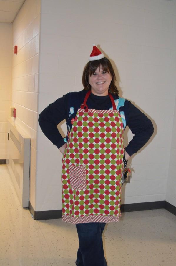 Staff member Lori Grant dresses up as Mrs. Clause on Thursday for Christmas spirit week.

