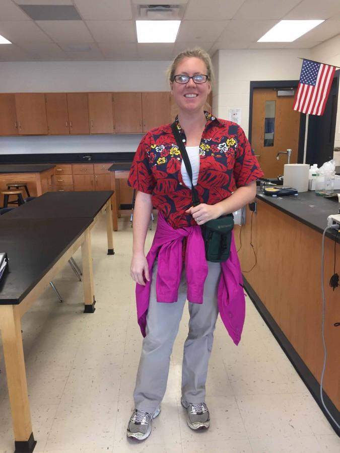 Science teacher Kirstin Murphy dresses as an old school tourist complete with a camera bag and running shoes for Holiday Vacation Day.


