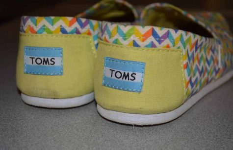 A pair of shoes does not fix world poverty