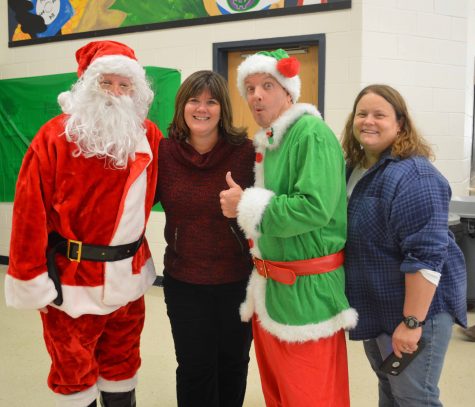 Santa Green and Elf Auchstetter visit the cafeteria