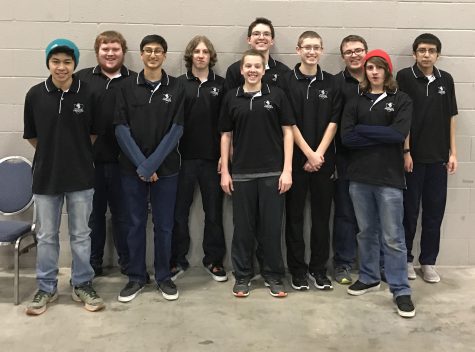 Ben Manugas, Garrett Buerke, Muize Rahman, Isaac Brazee, Ryan St. Peter, Kyle Wells, Dan Deboer, Joe Fahnestock, Mason Sampson, and Edgar Villafuerte pose for a team photo before going into the biggest competition of their season.