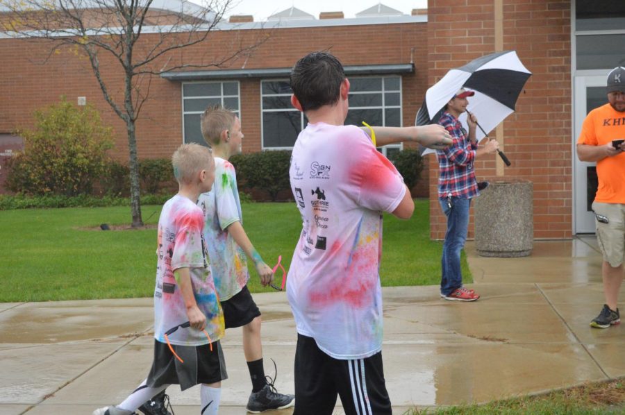 Kaneland community members ran through the rain to participate in the Kolor Run