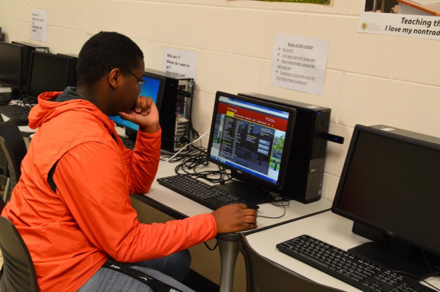 Senior Brandon Penman works in the College Career Center to help figure out his path in the future.