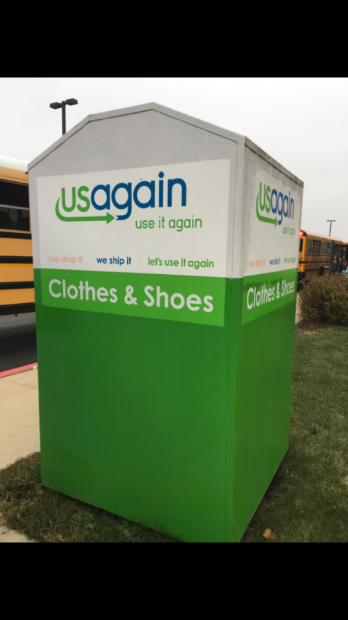 The clothing box can be found in front of the school.