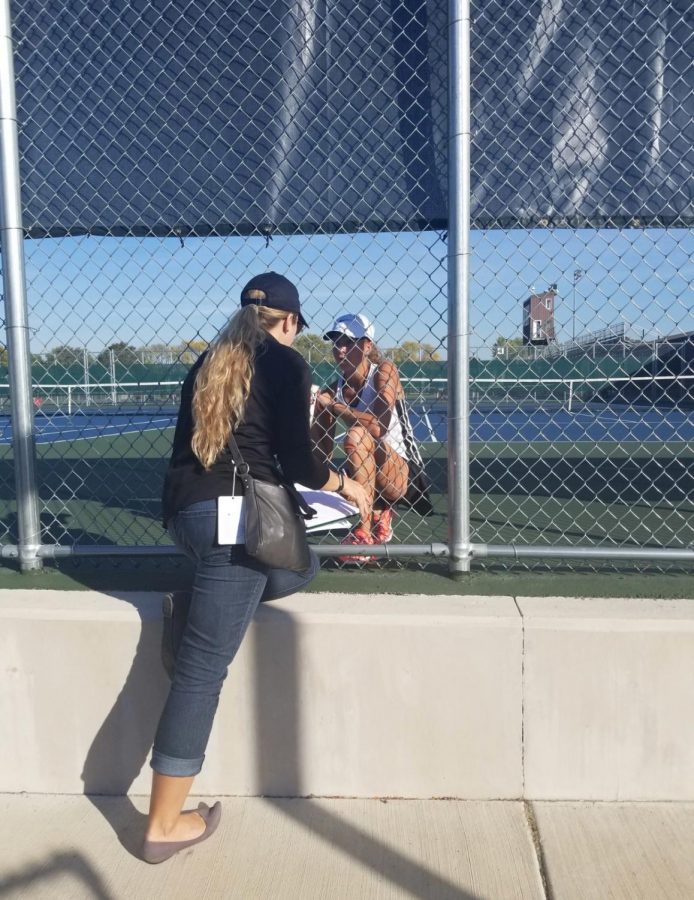 Piper Schrepferman talks to her coach Mallory Stoffregen before a match. 
Photo courtesy of Jim Schrepferman.