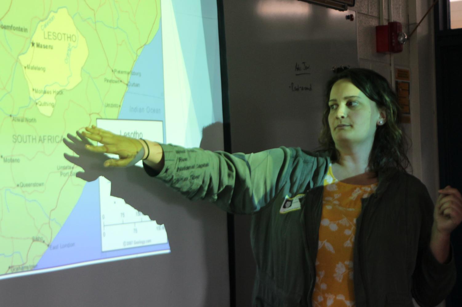 Graduate Katie Meuer teaches a class about where she lives in the country, Lesotho.