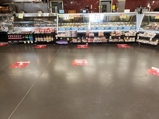 Social distancing stickers were placed down at the meat market in Jewel-Osco.