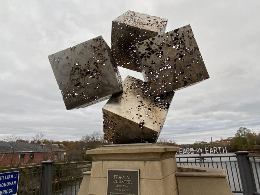 Fractal Cluster by Bruce White was created in 2013. Sitting on the William J. Donovan Bridge in Batavia, Fractal Cluster serves as a message to encourage people to appreciate and acknowledge historical scientific discoveries made in Batavia’s community. 