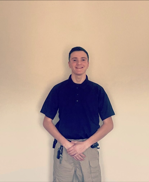Connor Anderson poses for his picture at his house back in December 2021. It was the first time he was ever in his Police Explorers uniform. 
