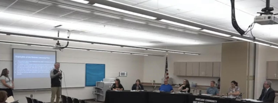 Director of Educational Services 6-12 Patrick Raleigh speaks in front of the board regarding the new plan for remote learning on emergency days. Raleigh explained the plan for online classes to take place during emergency days for grades 2-12. 