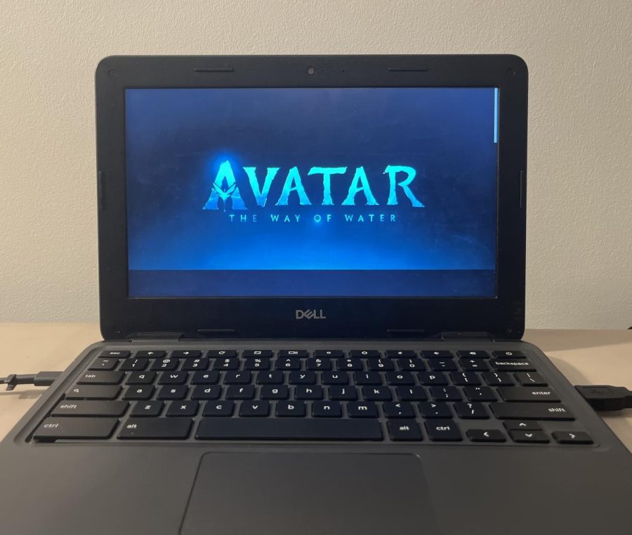 Avatar%3A+The+Way+of+Water+plays+on+a+laptop+computer.+Throughout+the+film%2C+computer-generated+imagery+can+be+seen.