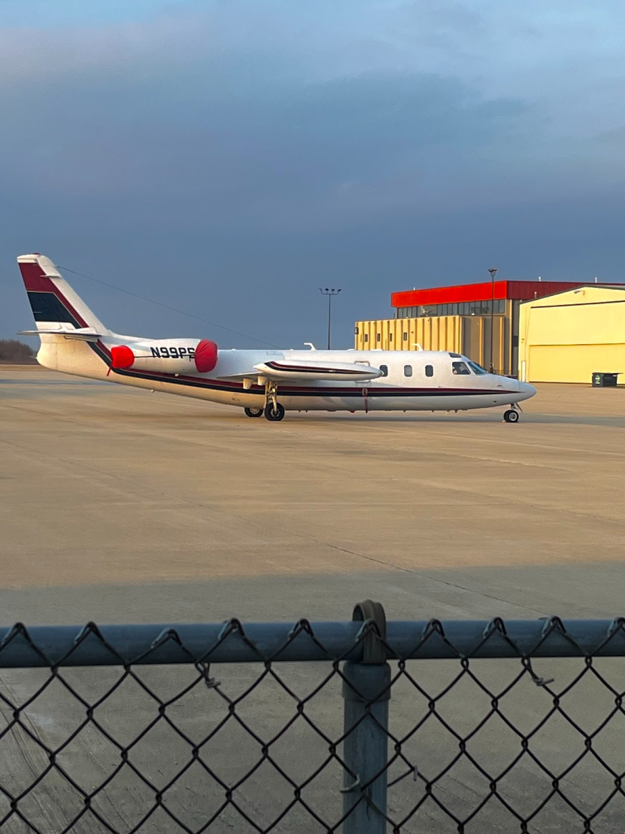 A private jet sits at Aurora Municipal Airport, located in the village of Sugar Grove. This jet was accompanied by several other jets nearby. 