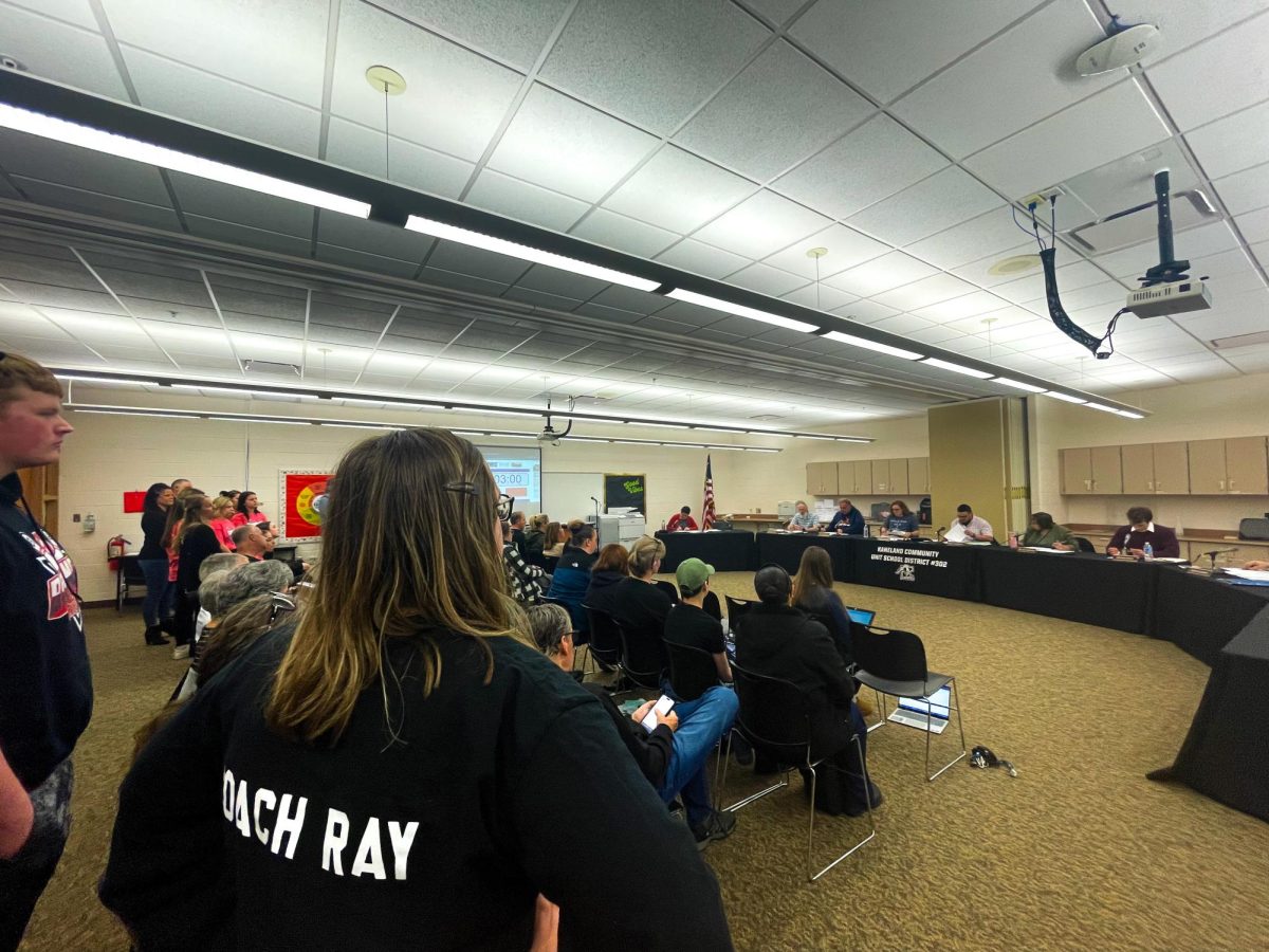 The+board+recognizes+Kaneland+High+Schools+winter+sports+teams+during+the+Superintendent+salute.+Each+sport+brought+coaches+and+athletes+to+tell+the+board+about+the+successes+of+their+seasons.