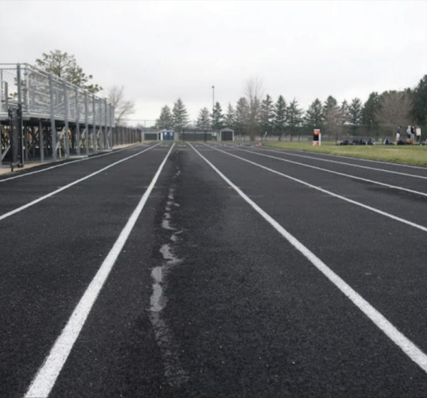 A crack in lane 5 spans the home stretch of Kanelands track. This crack has been involved in at least one injury of a track athlete whose spikes got caught while jogging.