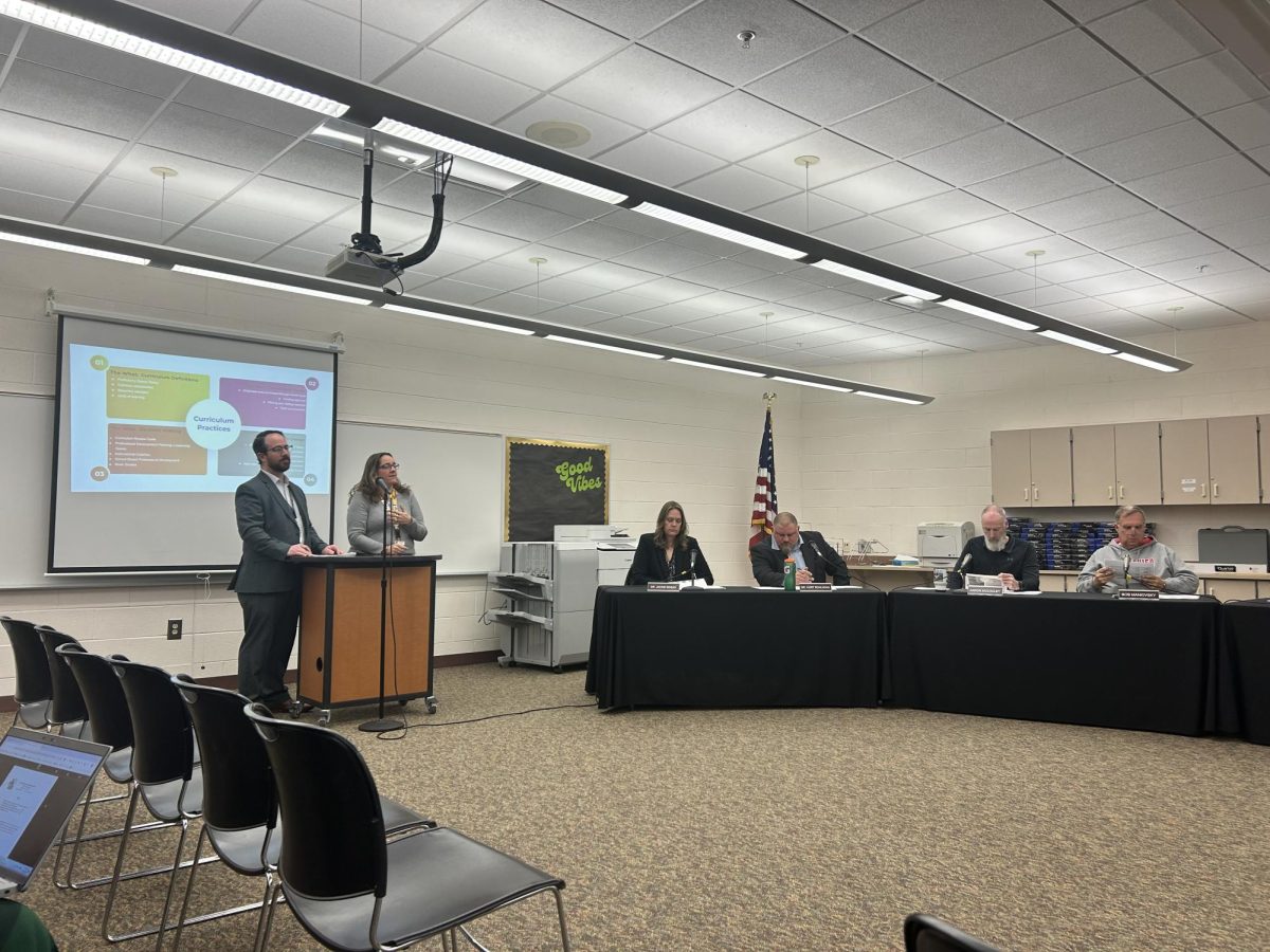 Director of Educational Services EC-5 Sarah Mumm and Director of Educational Services 6-12 James Horne present a slideshow covering curriculum practices within the district. This was the first of a series of presentations, with the next one focusing on English Language Arts.