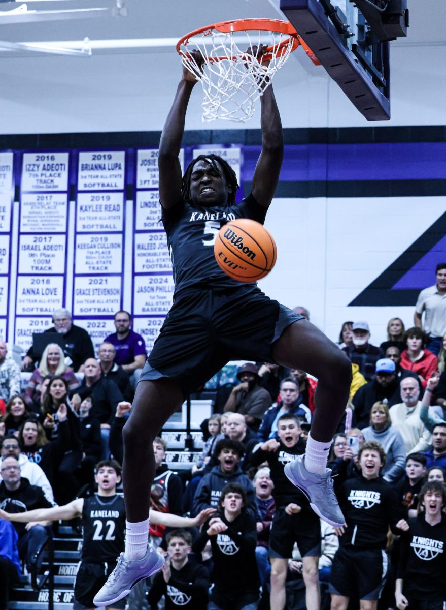 The Kaneland varsity boys basketball team defeats Yorkville Christian High School to win the Plano Christmas Classic championship. This victory marked a historic moment for Kaneland, making them the first school to win five championships in the tournament's 61-year history. 