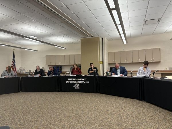 Members of the Board of Education discuss the budget plans for 2025-26. The board approved the budget, which includes 32.28 full-time equivalent (FTE) staff reductions throughout the district. 